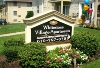 Whitestone Village Apartments sign apartment signage