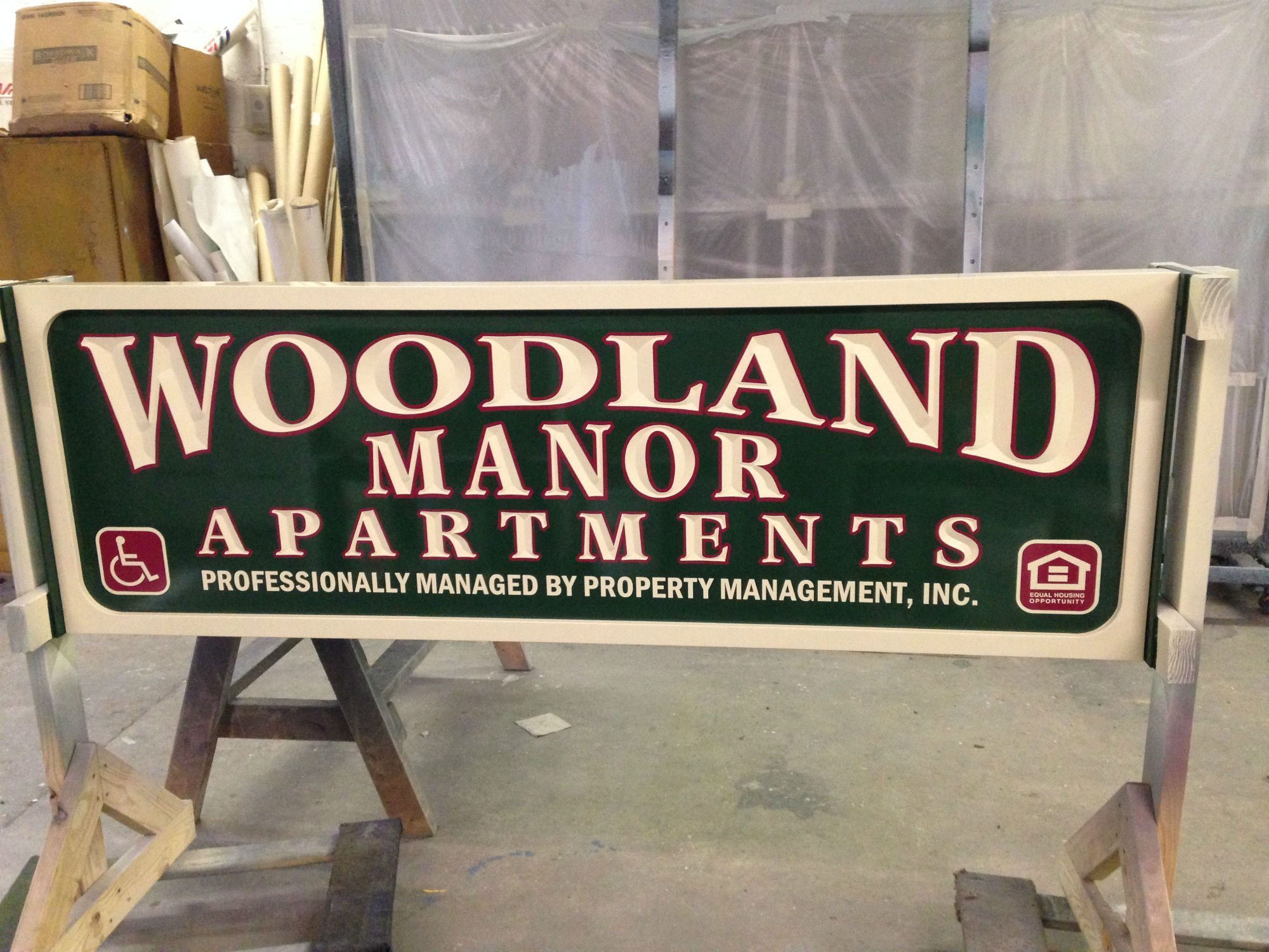 apartments-carved-sign