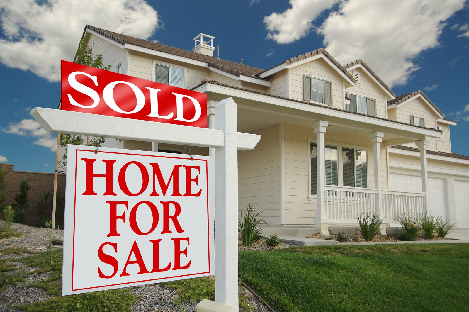 Sold Home For Sale Sign in front of Beautiful New Home. Realtor Sign.