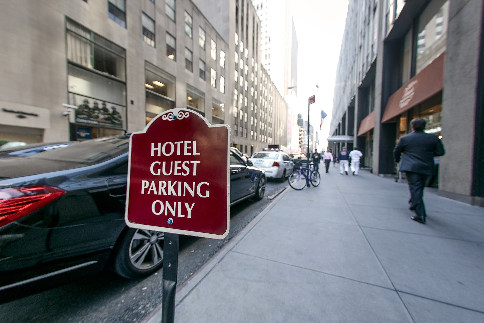 informational hotel parking sign