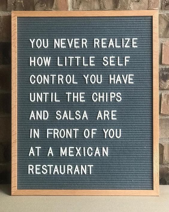 Sign about chips and salsa at Mexican food restaurants