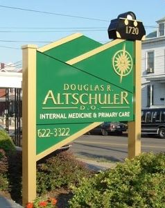 douglas altschuler free standing outdoor green sign