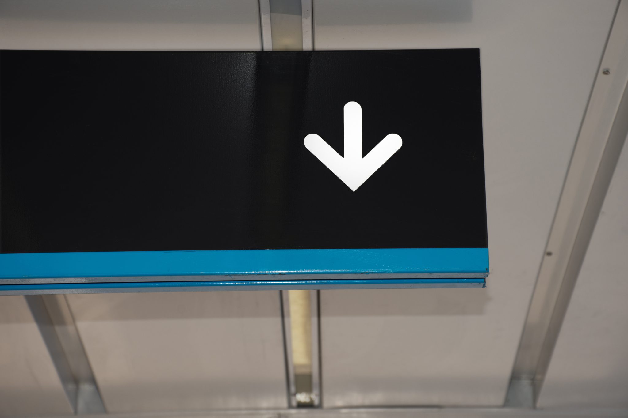 subway-white-arrow-black-background Directional signage helps professionals find their way around