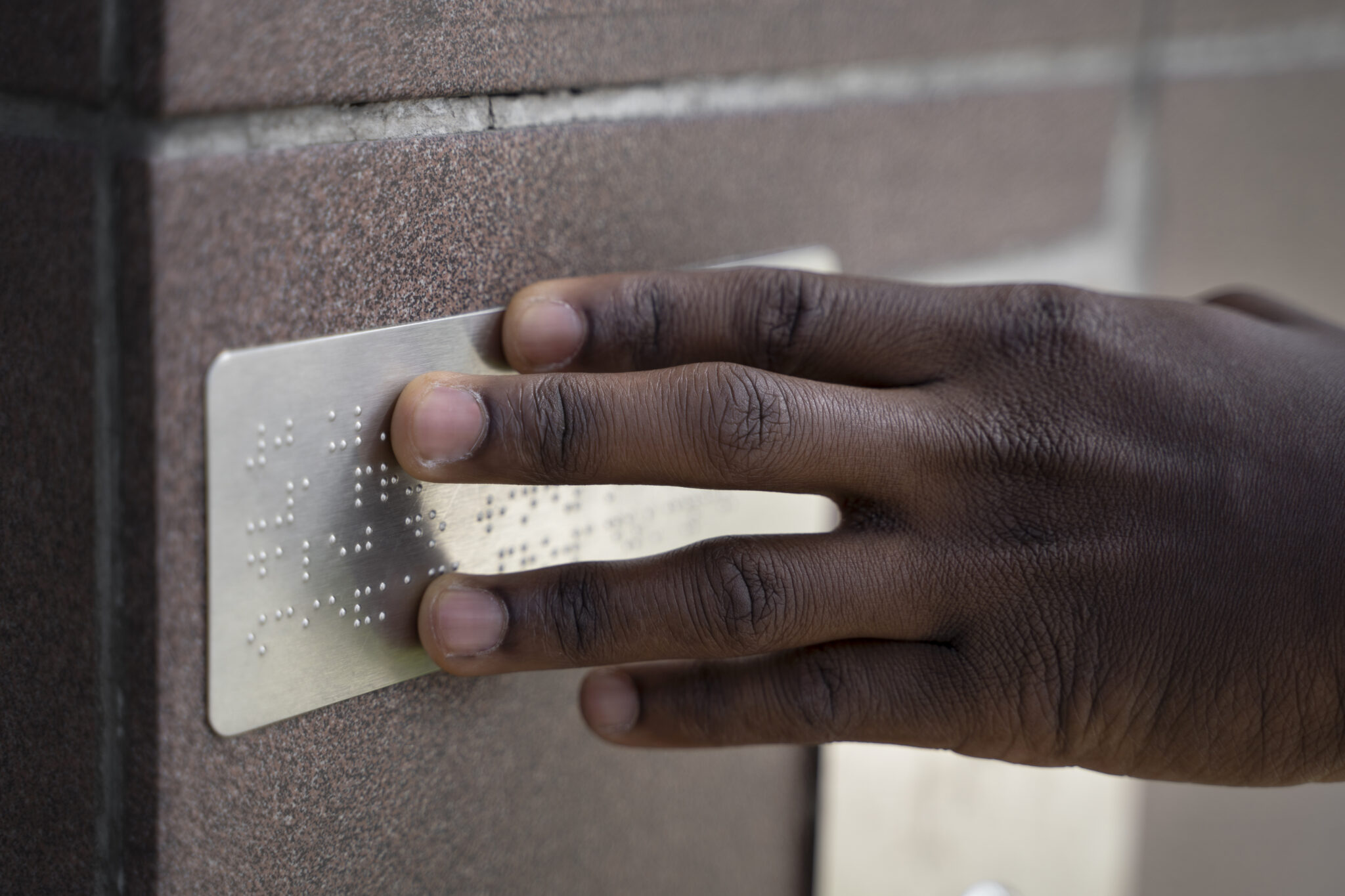 side-view-hand-using-braille-alphabet