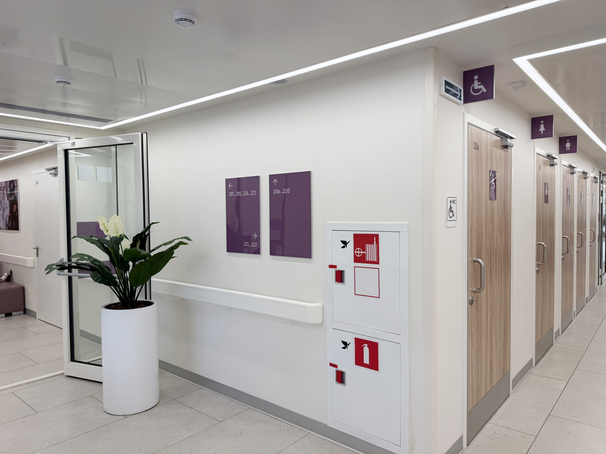 hospital-hallway-with-restrooms-signage